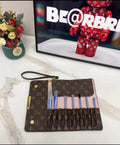 Cartera para brochas de maquillaje